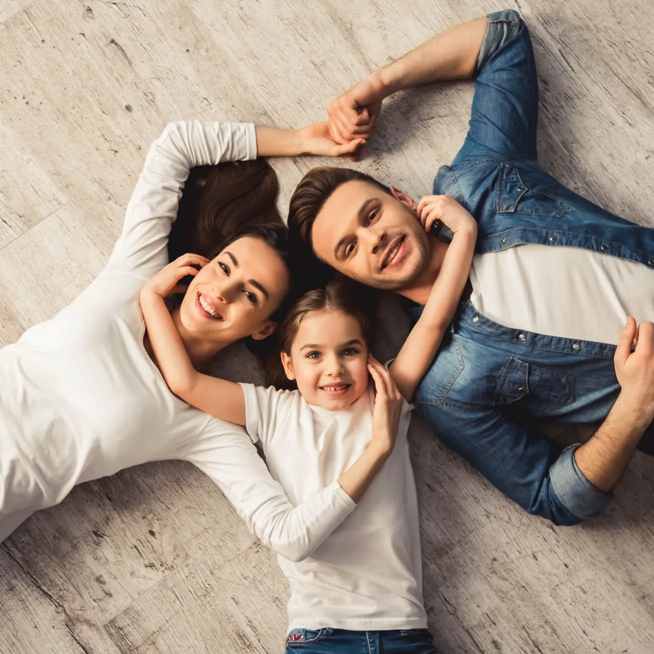 Family laying on floor