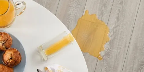 Juice spills on vinyl floor